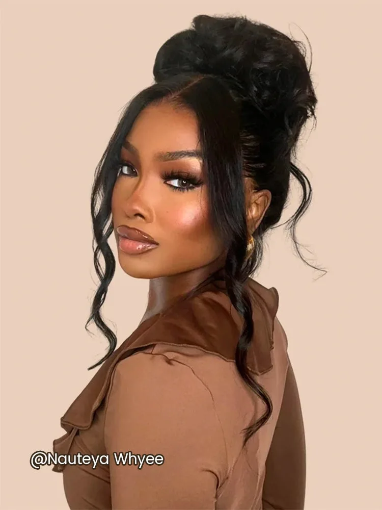 A softly styled updo with face-framing curls